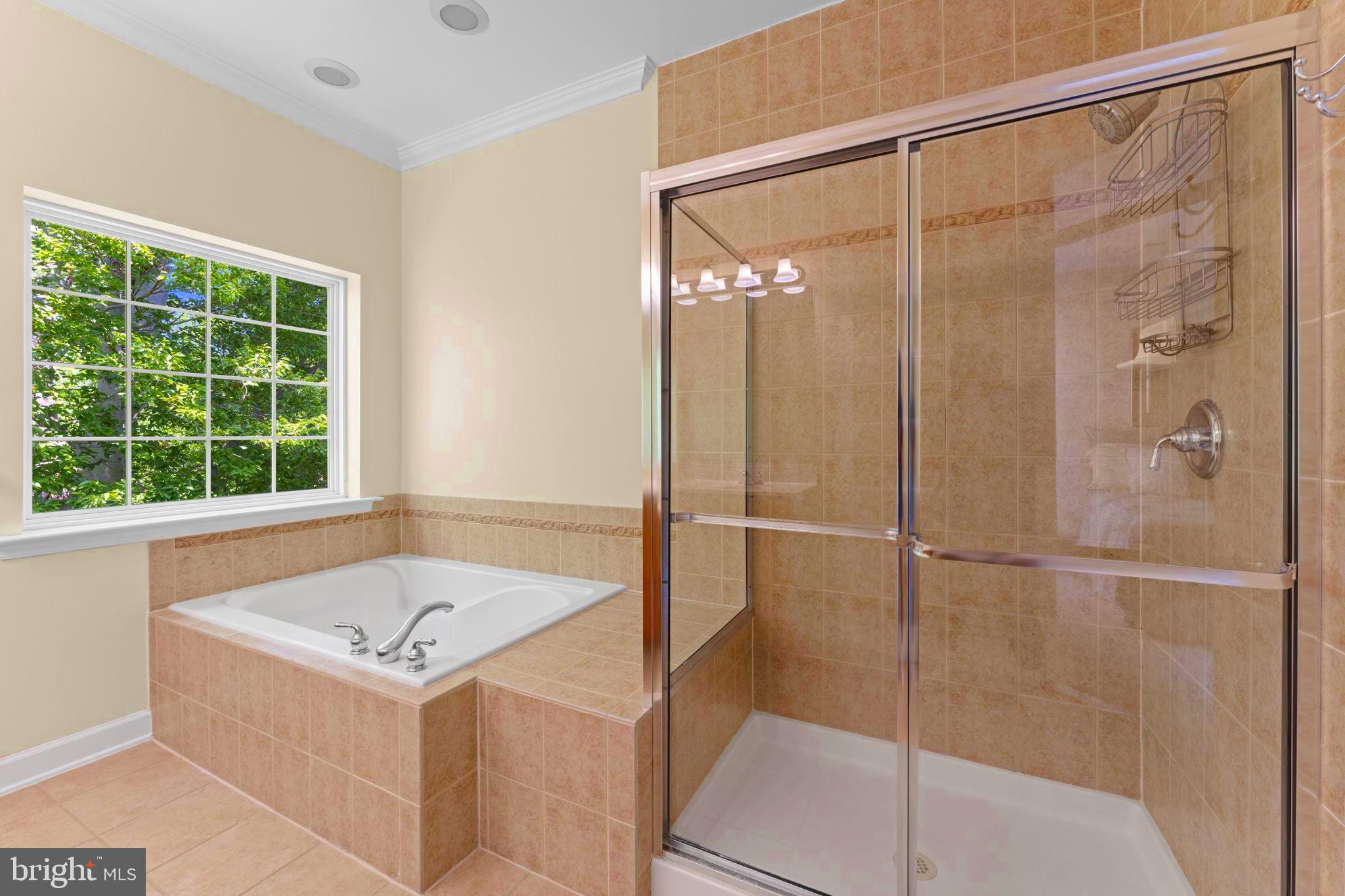 8120 Mississippi Road Laurel, MD 20724 - Photo 37 of 50 Ensuite bathroom w/ high-end ceramic tiles