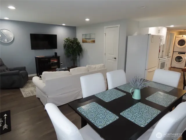 a living room with a couch and a flat screen tv