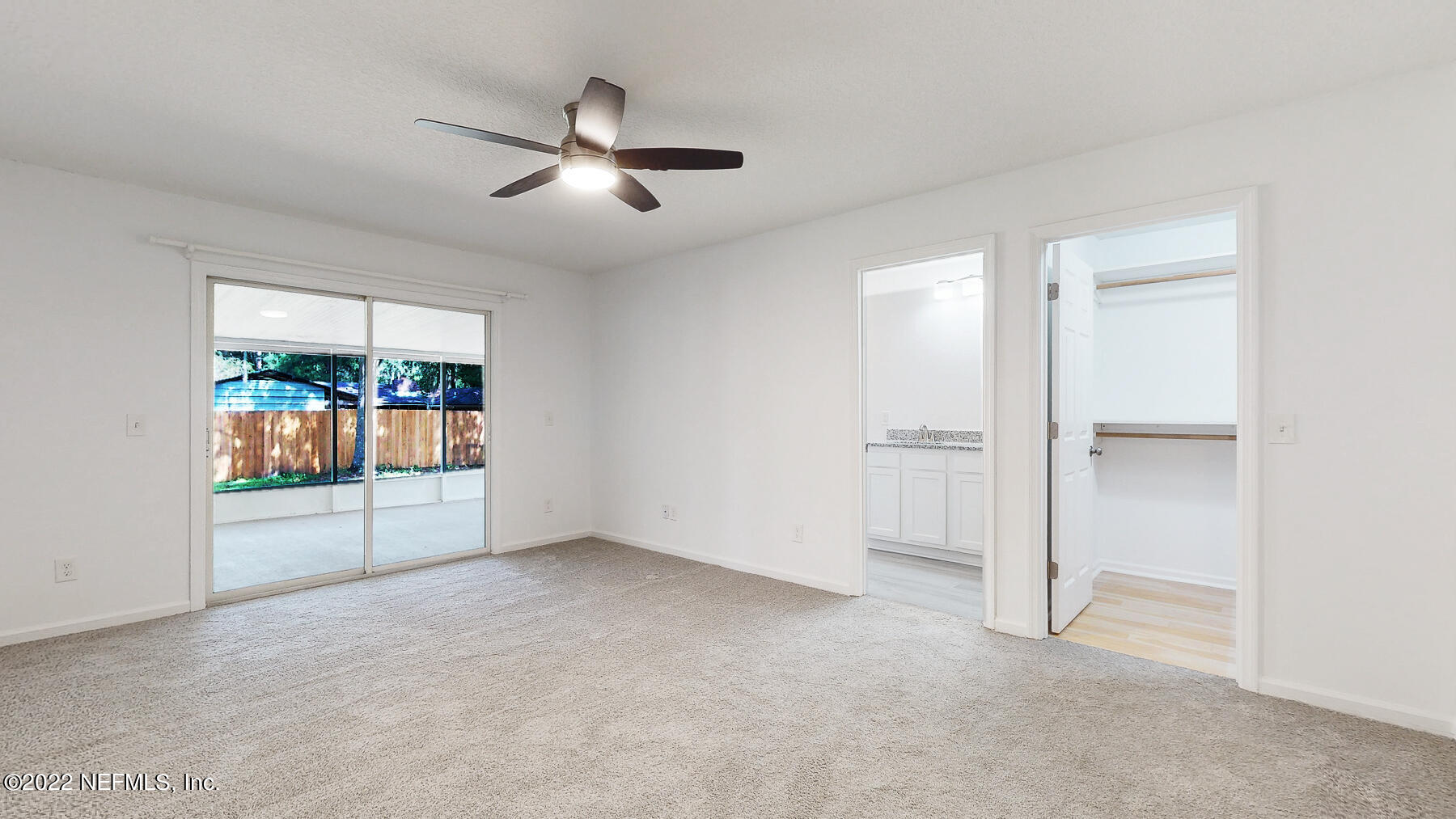 745 Ebb Tide Drive Fleming Island, FL 32003 - Photo 21 of 38 a view of an empty room with a window