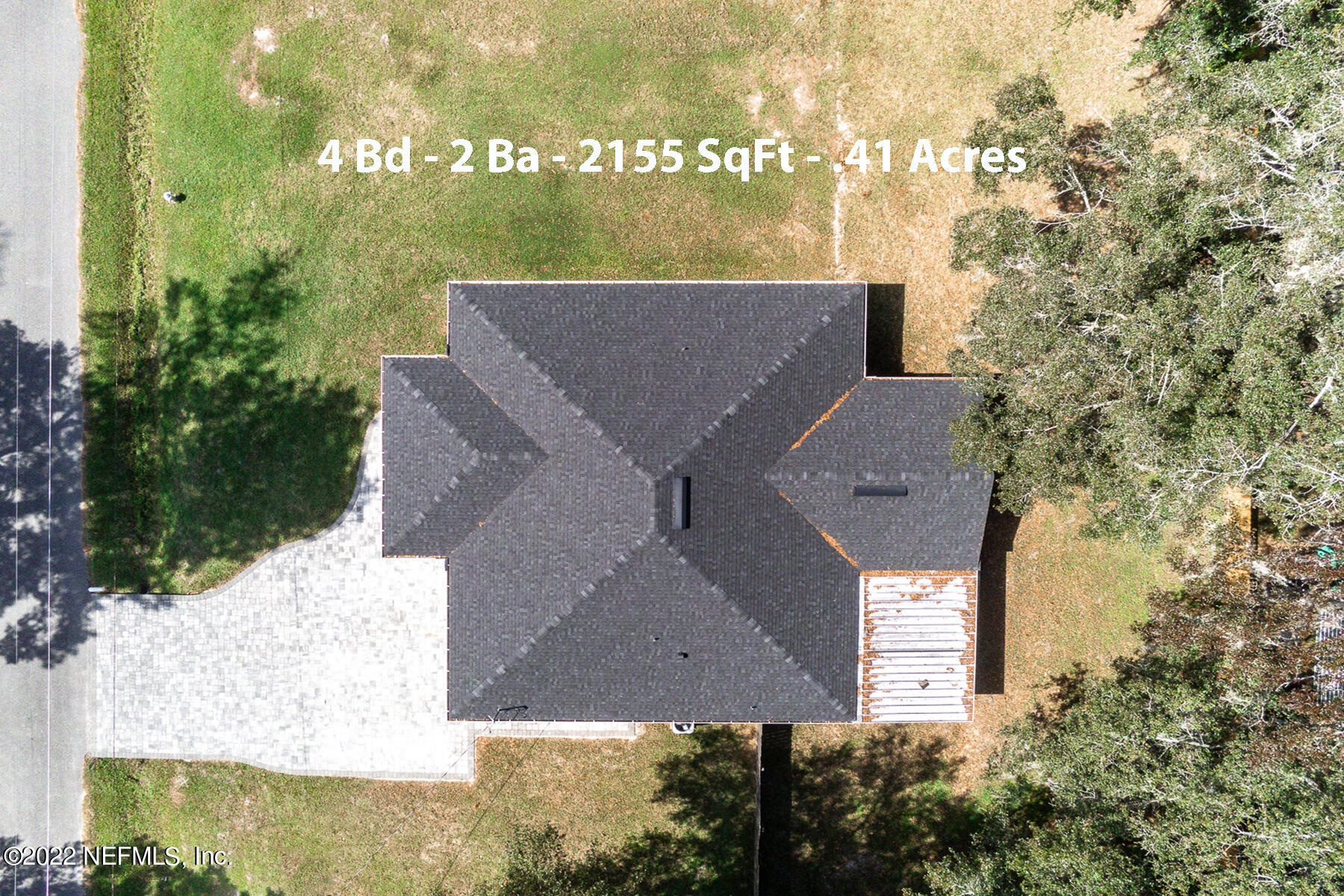 745 Ebb Tide Drive Fleming Island, FL 32003 - Photo 3 of 38 an aerial view of house with yard and mountain view in back