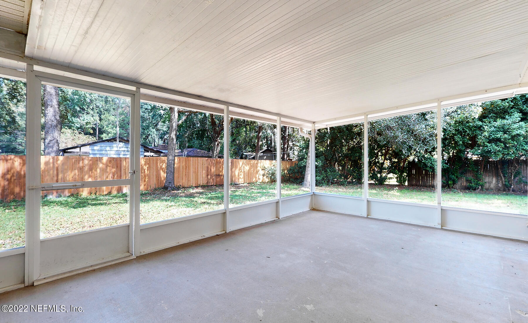 745 Ebb Tide Drive Fleming Island, FL 32003 - Photo 33 of 38 a view of a room with porch and garden