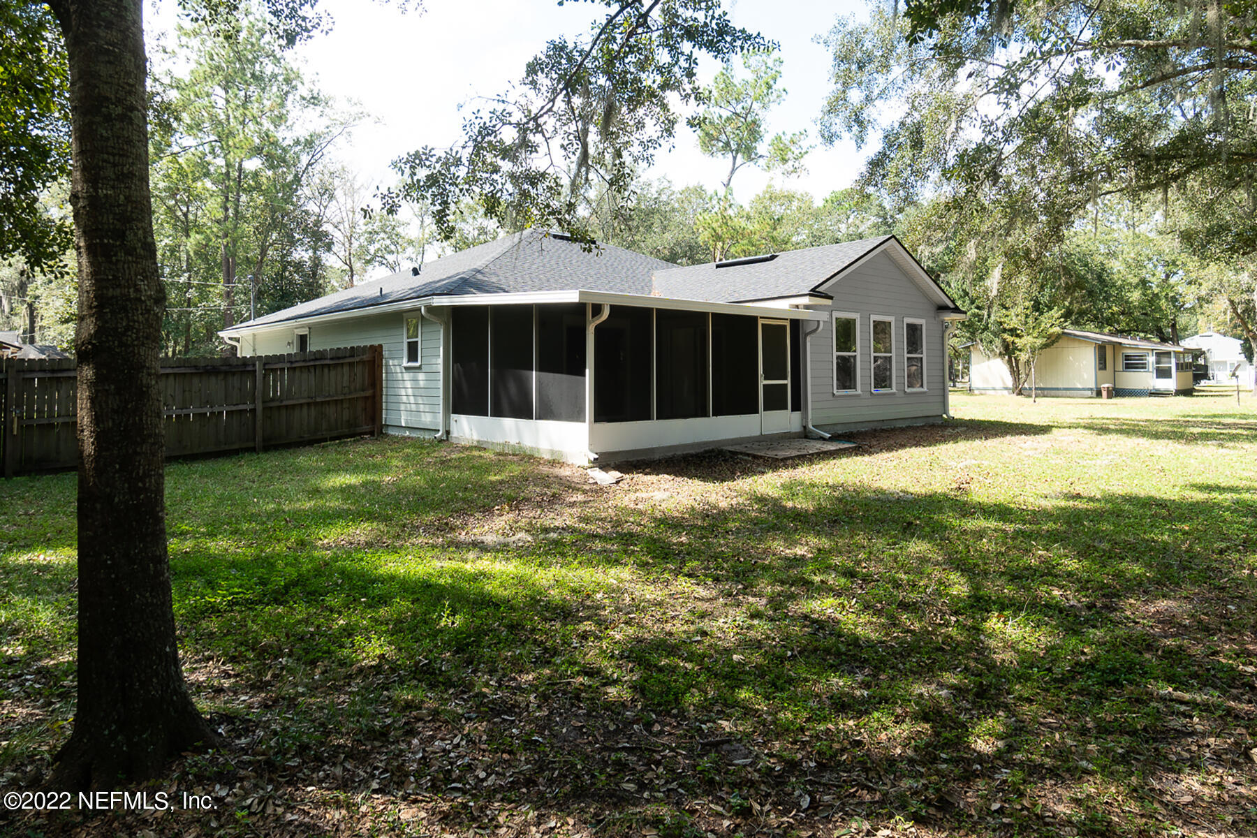 745 Ebb Tide Drive Fleming Island, FL 32003 - Photo 36 of 38 a view of a house with a yard