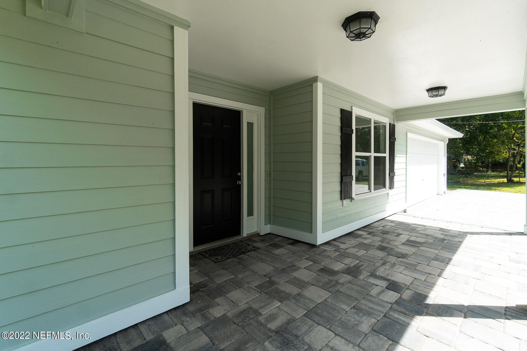 745 Ebb Tide Drive Fleming Island, FL 32003 - Photo 7 of 38 a view of front door of a house
