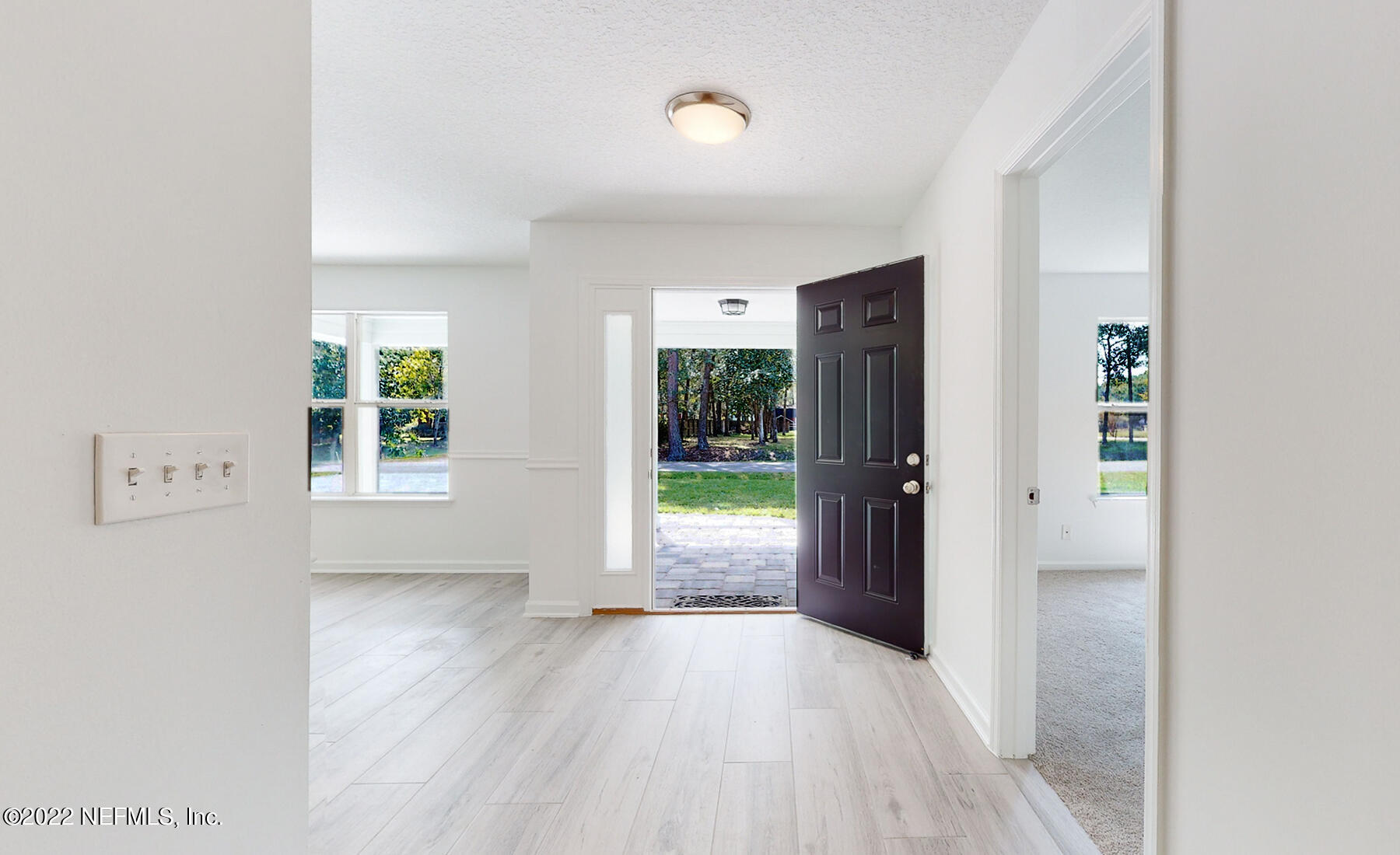 745 Ebb Tide Drive Fleming Island, FL 32003 - Photo 9 of 38 a view of an empty room with a window