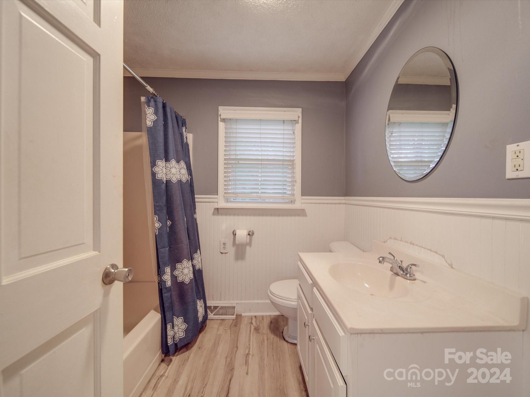 20082 Coley Store Road Locust, NC 28097 - Photo 17 of 43 a bathroom with a sink and a mirror