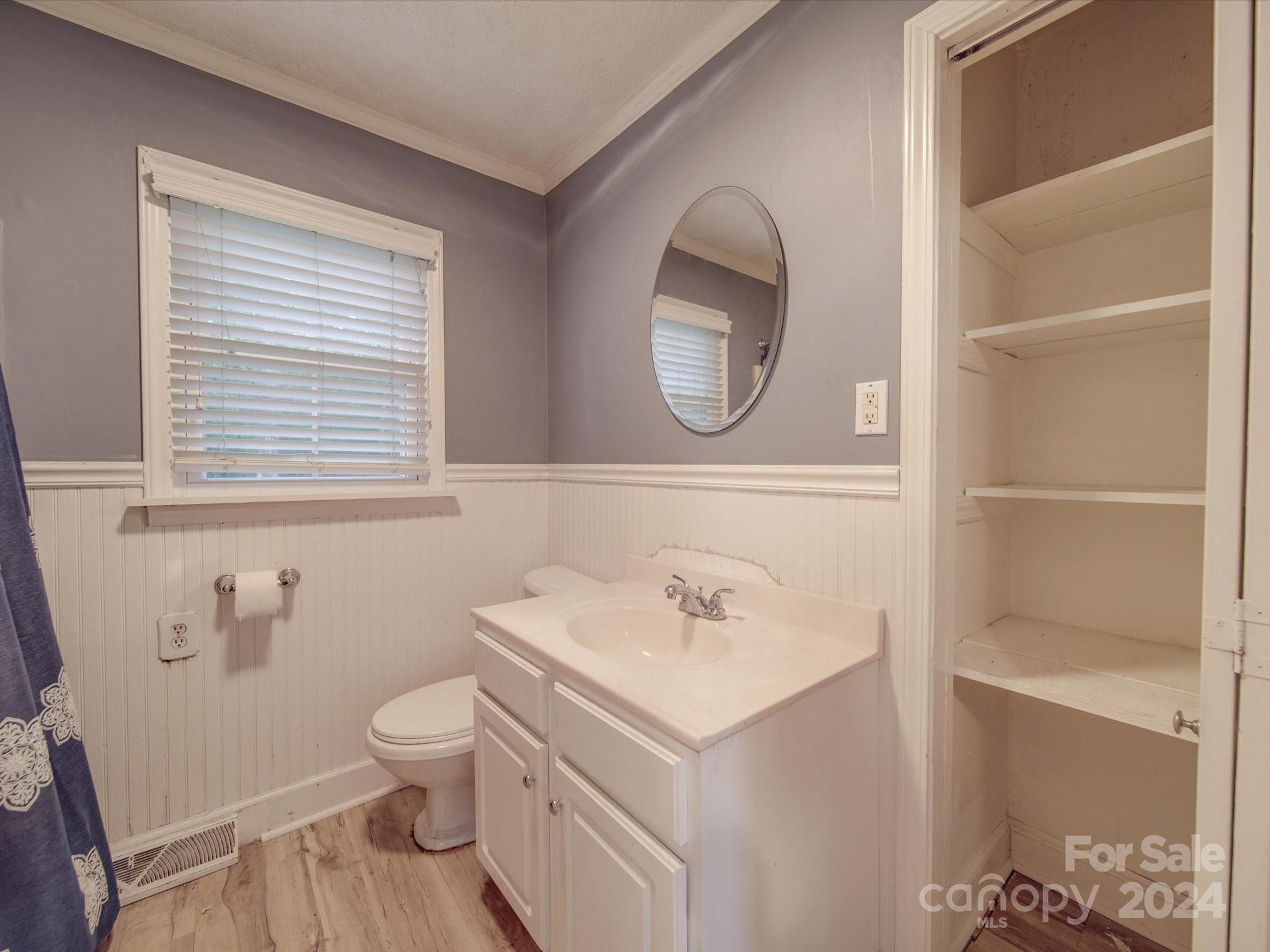 20082 Coley Store Road Locust, NC 28097 - Photo 18 of 43 a bathroom with a sink and a mirror