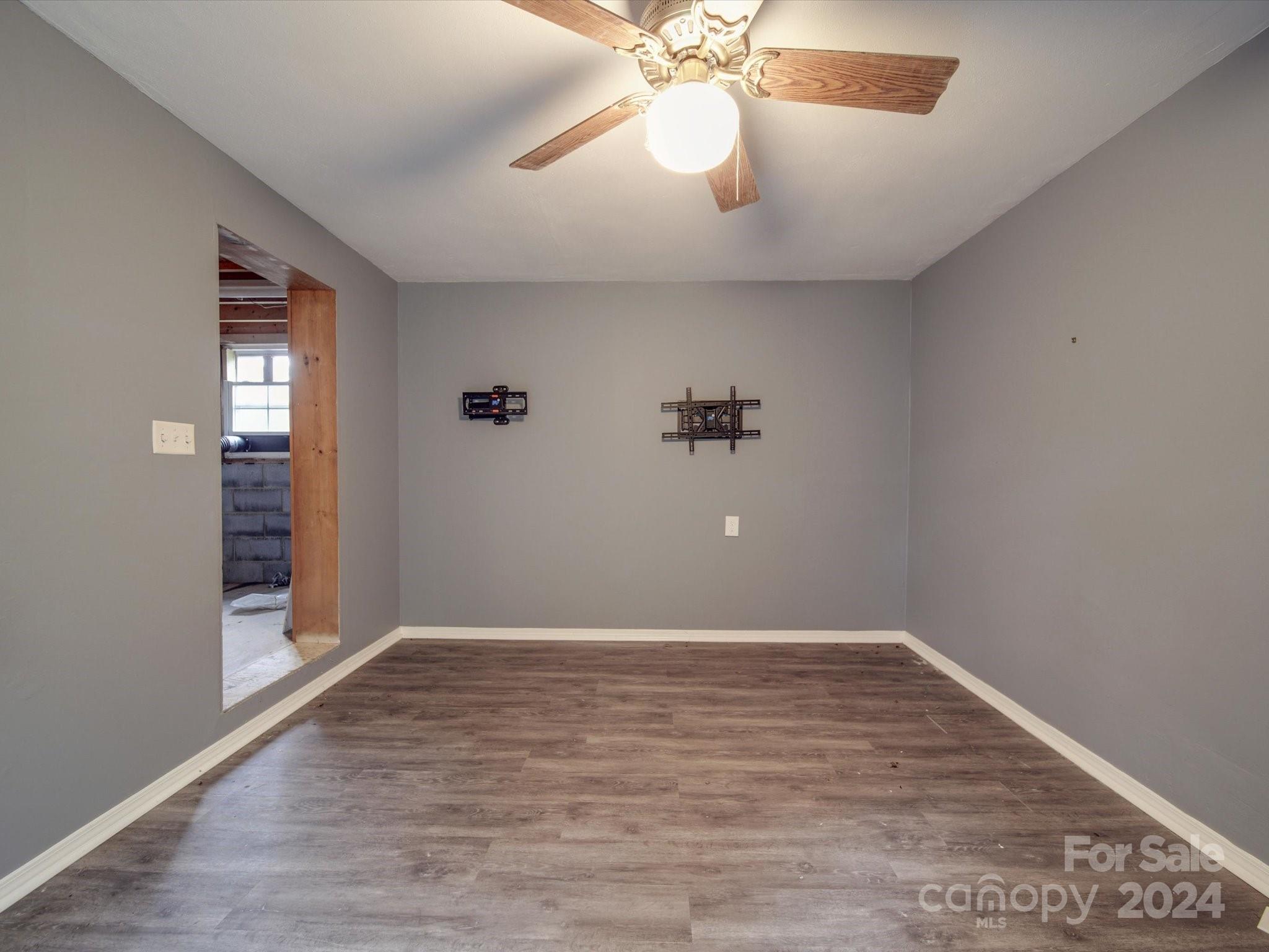 20082 Coley Store Road Locust, NC 28097 - Photo 30 of 43 wooden floor in an empty room