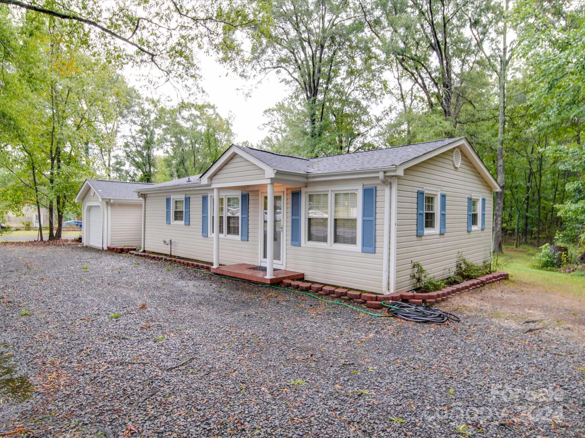 20082 Coley Store Road Locust, NC 28097 - Photo 3 of 43 a view of a house with a yard