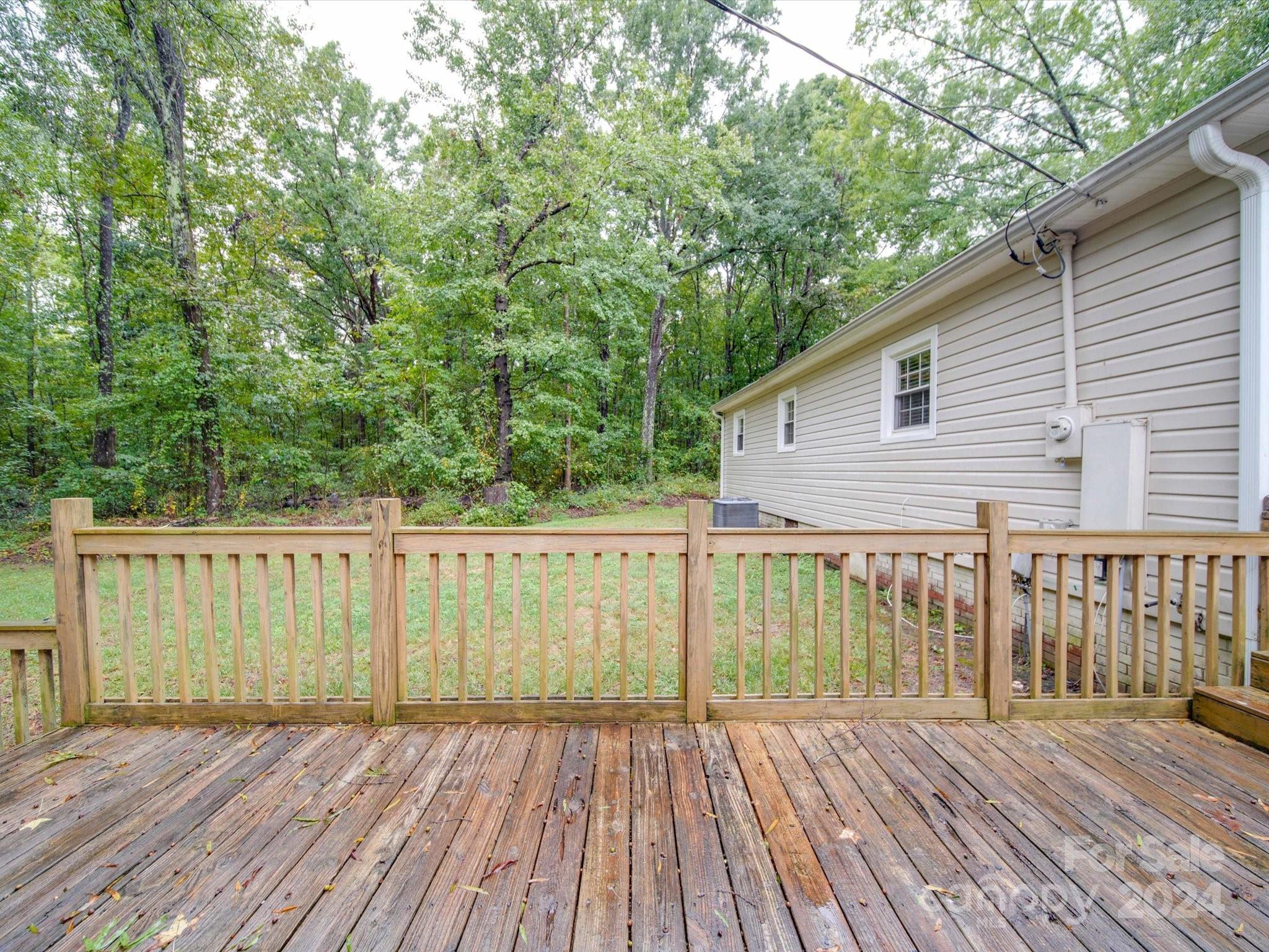 20082 Coley Store Road Locust, NC 28097 - Photo 38 of 43 a view of backyard with deck and wooden floor