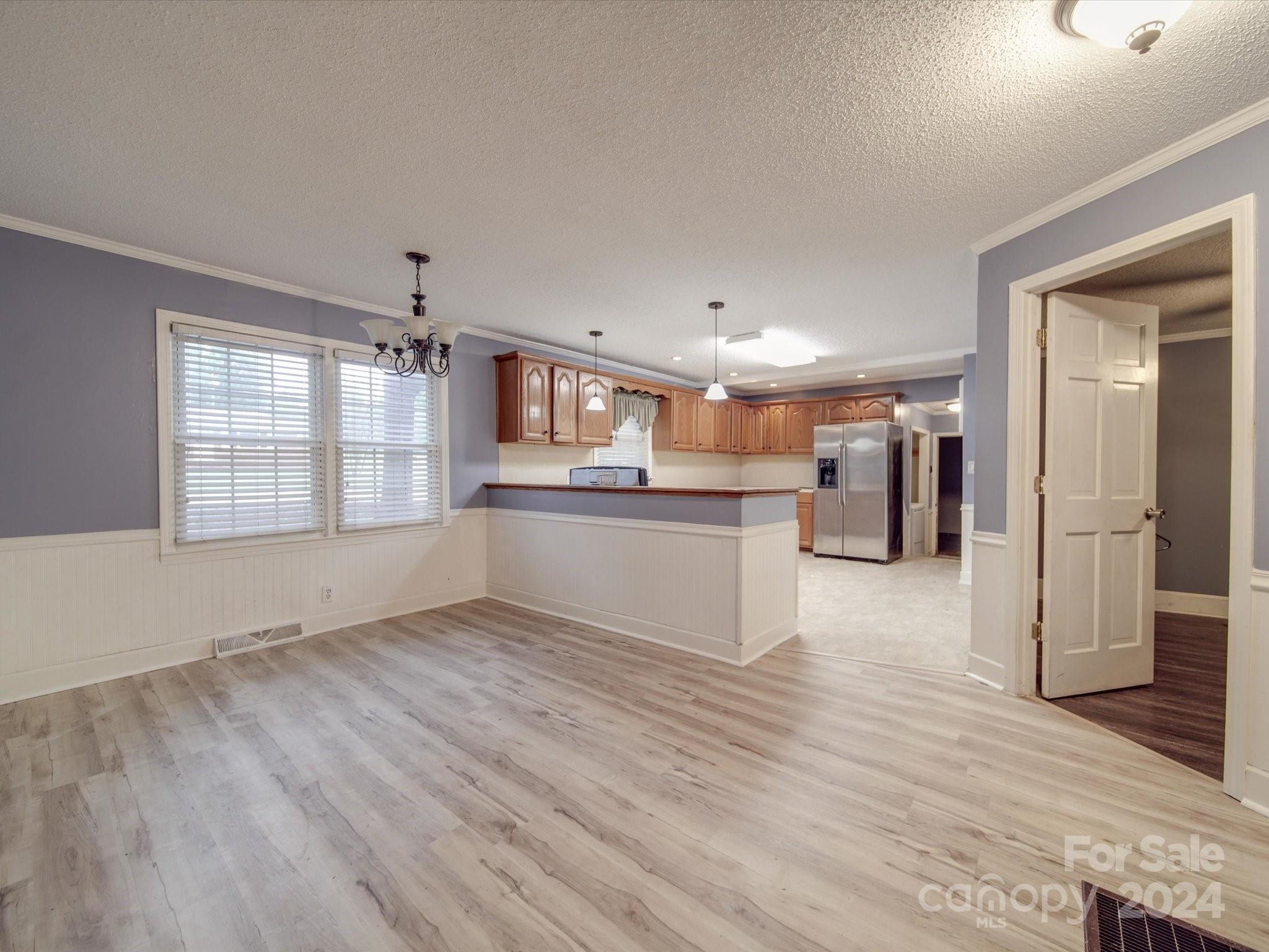 20082 Coley Store Road Locust, NC 28097 - Photo 7 of 43 a view of a kitchen with a sink and cabinet