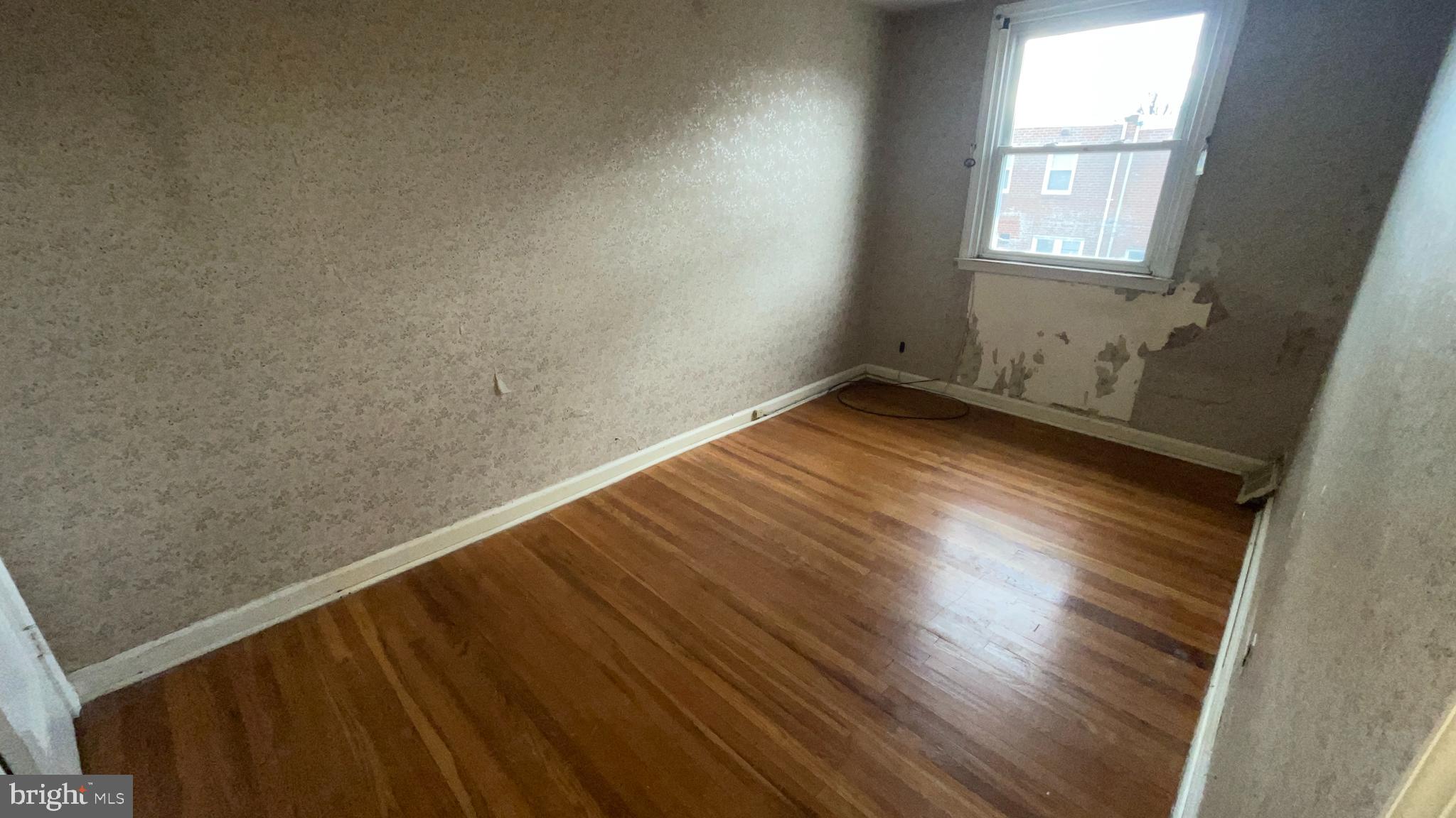 3042 Fairfield Street Philadelphia, PA 19136 - Photo 14 of 23 a view of a room with wooden floor and window