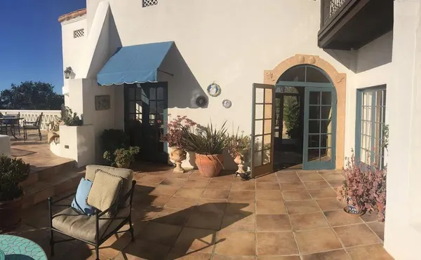 a view of a glass door with a outdoor space