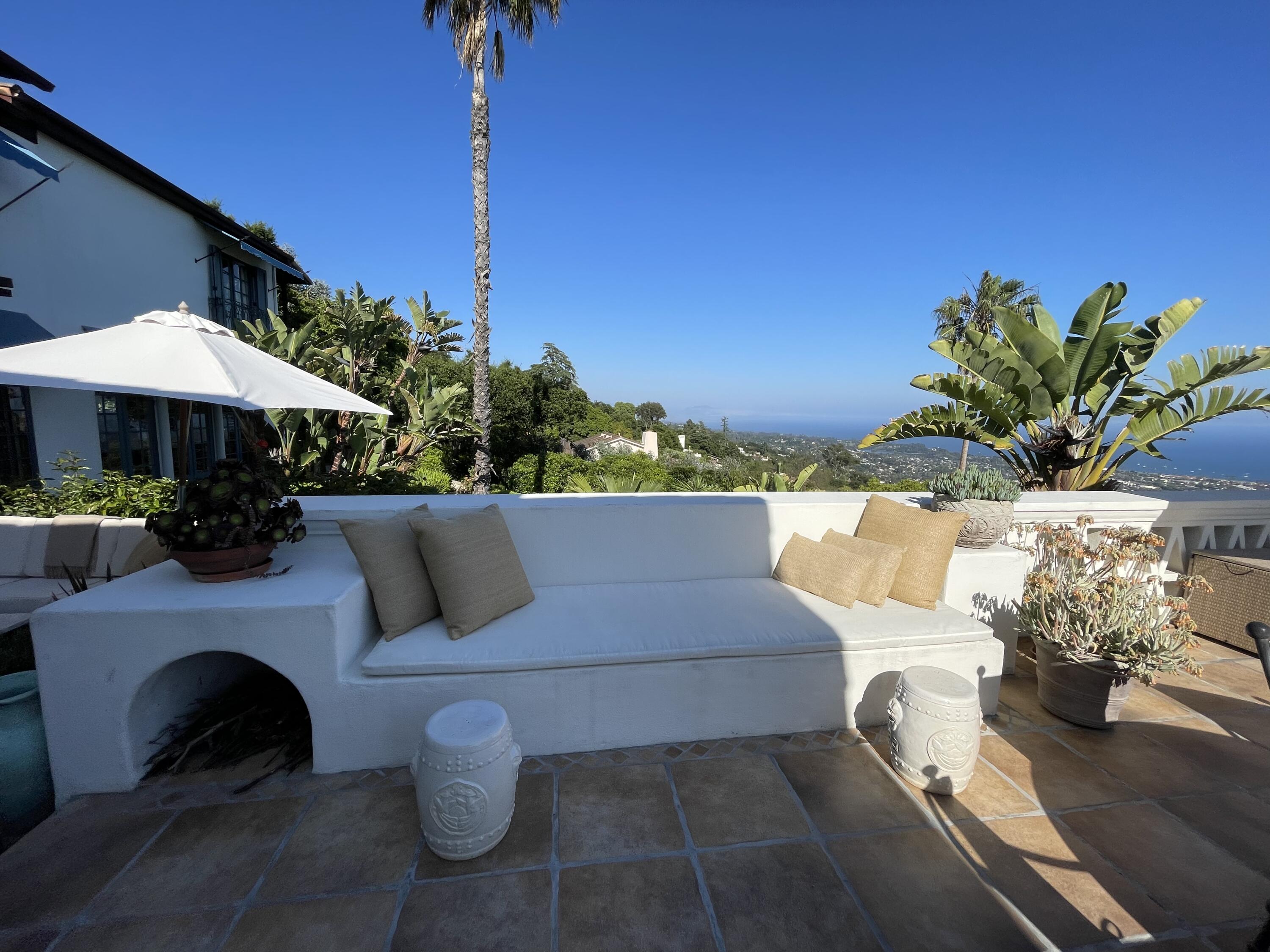 0 Mission Ridge Road Santa Barbara, CA 93103 - Photo 24 of 71 a view of a patio with couches and potted plants