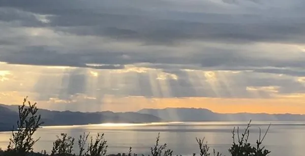 a kitchen with a stove and cabinets