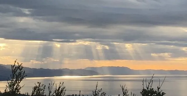 a kitchen with a stove and cabinets