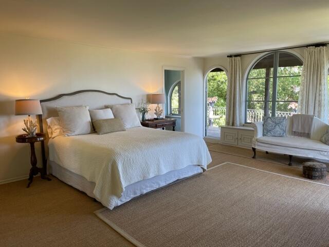 0 Mission Ridge Road Santa Barbara, CA 93103 - Photo 28 of 71 a bedroom with a bed and a couch next to a window