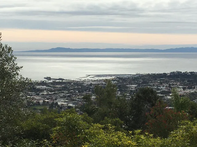 a view of a backyard with sitting area and furniture