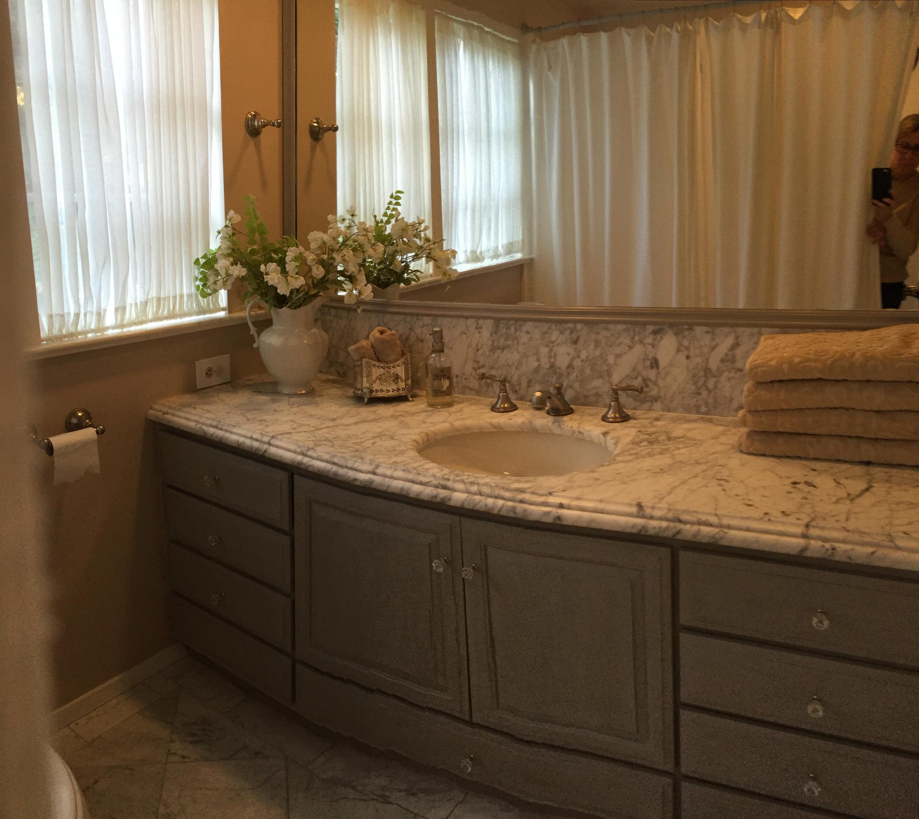 0 Mission Ridge Road Santa Barbara, CA 93103 - Photo 32 of 71 a bathroom with a granite countertop sink and a mirror