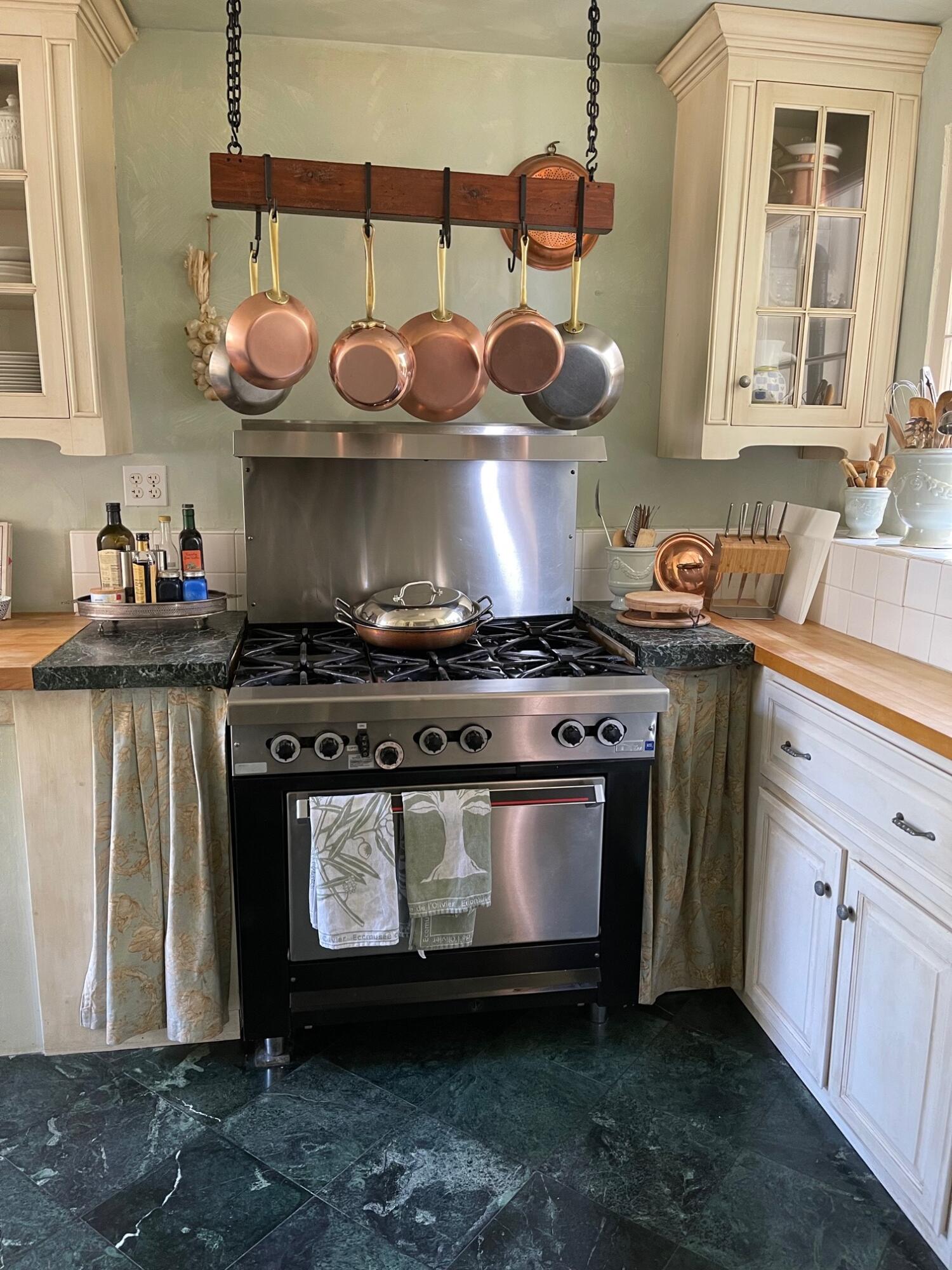 0 Mission Ridge Road Santa Barbara, CA 93103 - Photo 37 of 71 a kitchen with a stove and cabinets