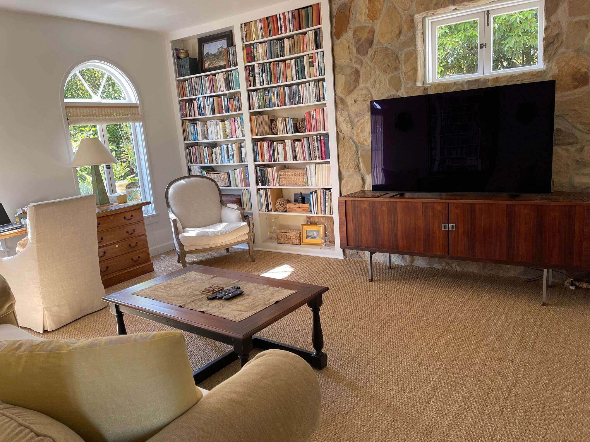 0 Mission Ridge Road Santa Barbara, CA 93103 - Photo 40 of 71 a living room with furniture a flat screen tv and a window