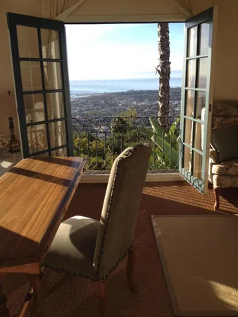 a patio with tables and chairs