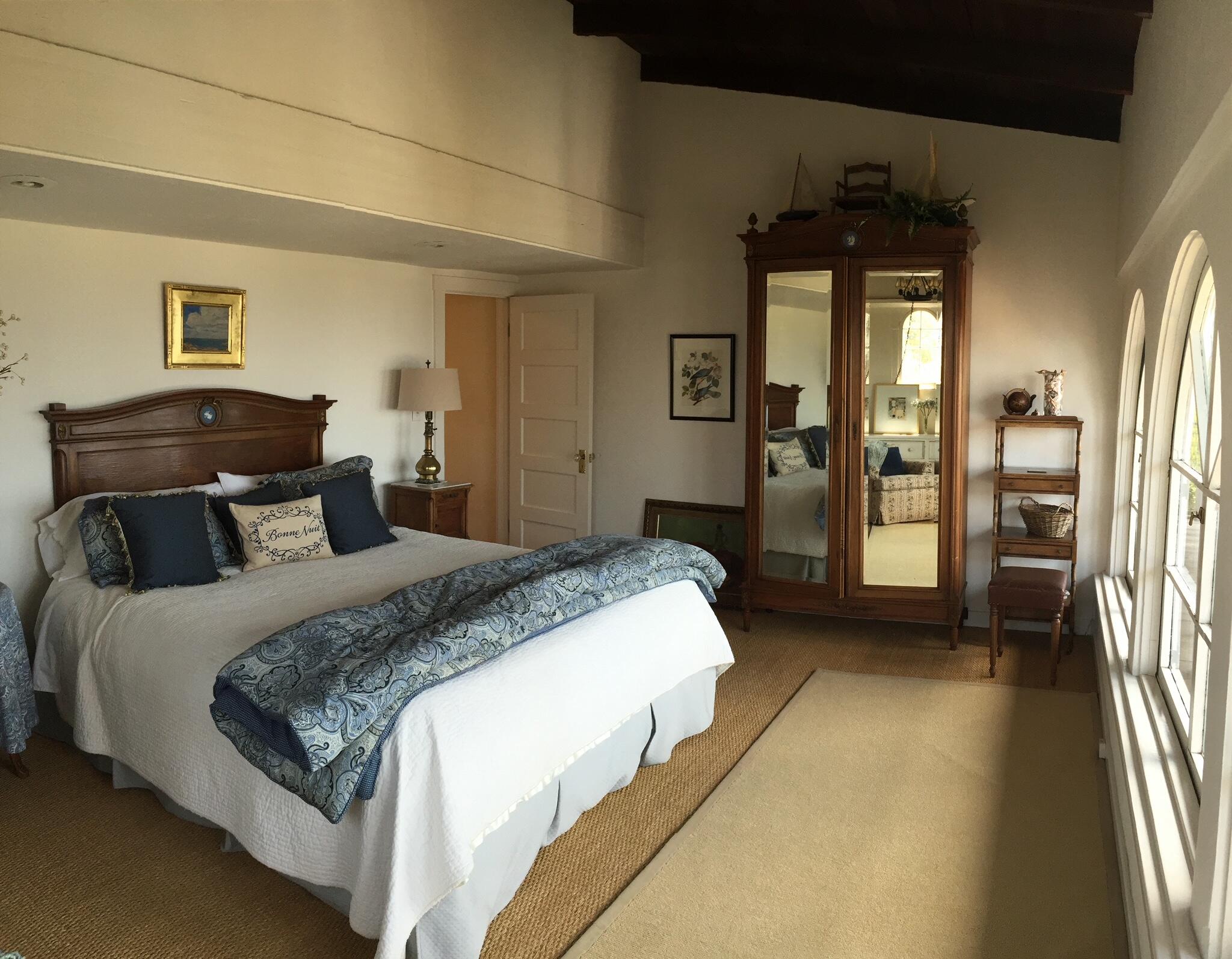 0 Mission Ridge Road Santa Barbara, CA 93103 - Photo 51 of 71 a bedroom with a bed and a chandelier