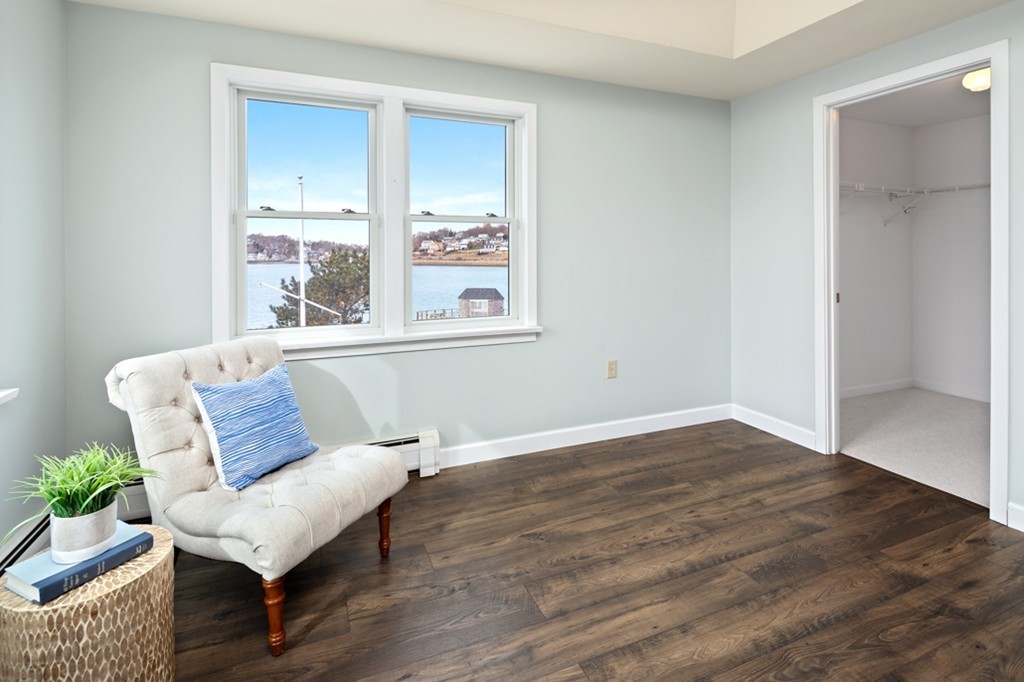 2 Marina Drive, Unit 2 Hull, MA 02045 - Photo 14 of 30 a living room with furniture and a window