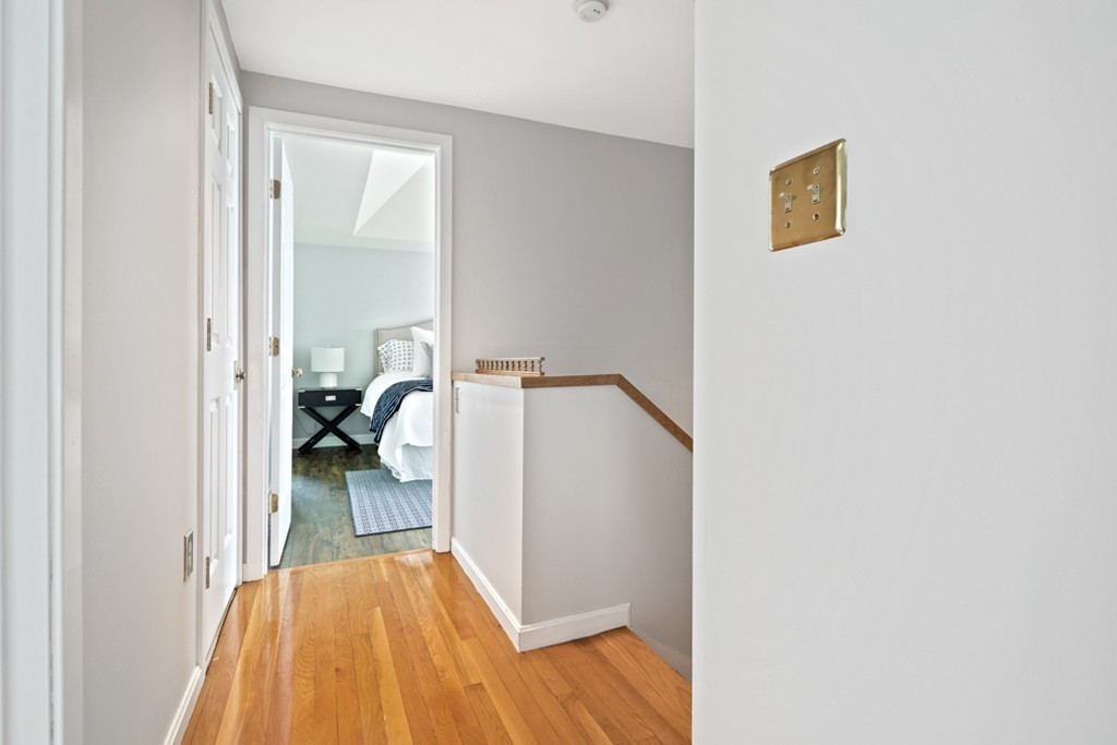 2 Marina Drive, Unit 2 Hull, MA 02045 - Photo 19 of 30 a view of a bedroom from a hallway