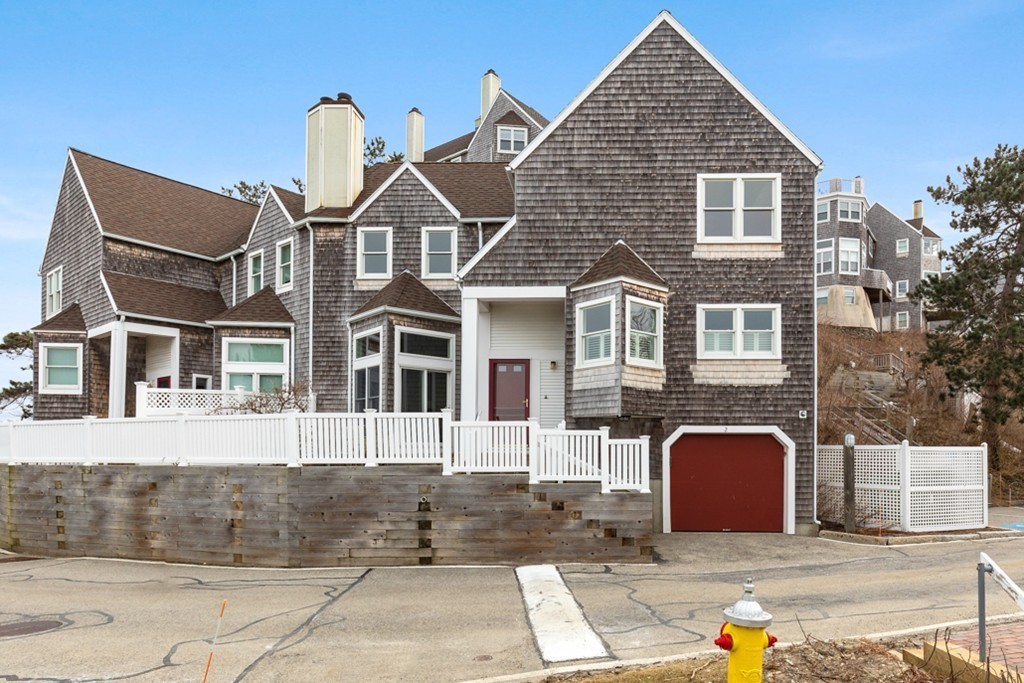 2 Marina Drive, Unit 2 Hull, MA 02045 - Photo 20 of 30 a front view of a house with glass windows