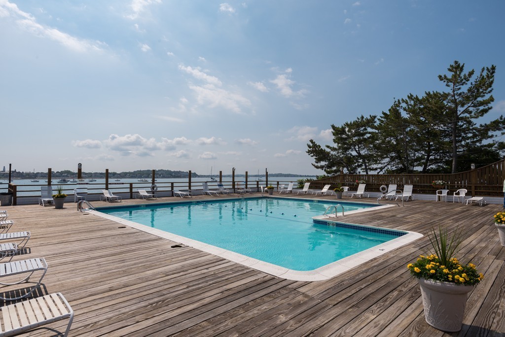 2 Marina Drive, Unit 2 Hull, MA 02045 - Photo 22 of 30 a view of a terrace with chairs