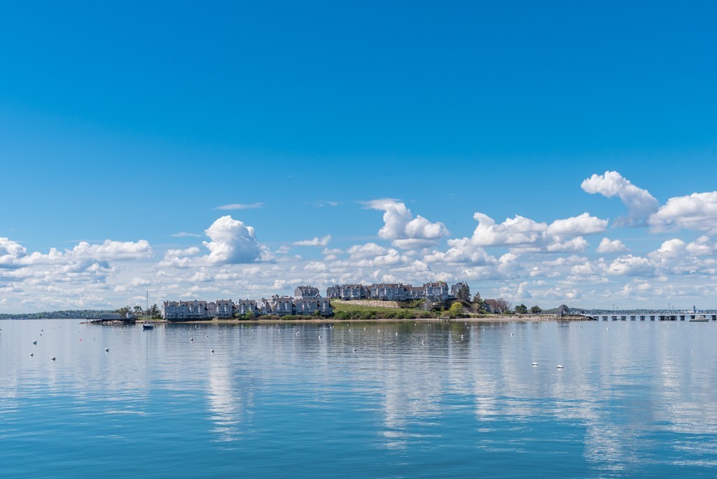 2 Marina Drive, Unit 2 Hull, MA 02045 - Photo 26 of 30 a view of a lake with houses
