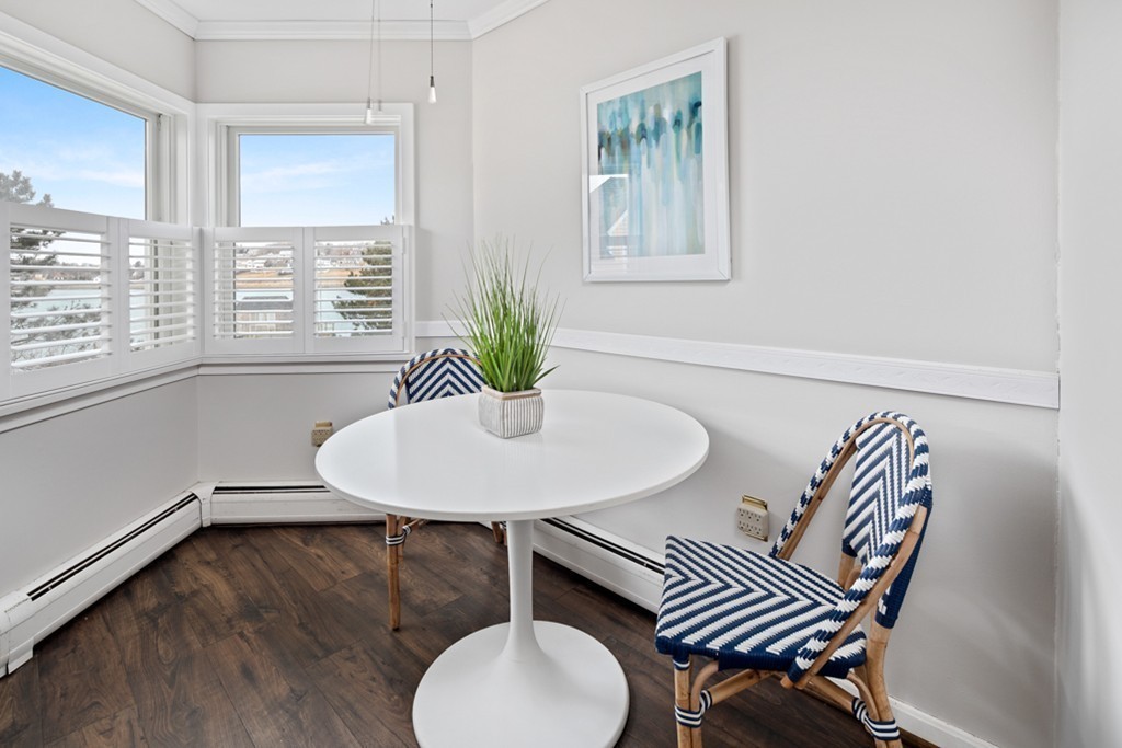 2 Marina Drive, Unit 2 Hull, MA 02045 - Photo 10 of 30 a dining room with furniture and wooden floor