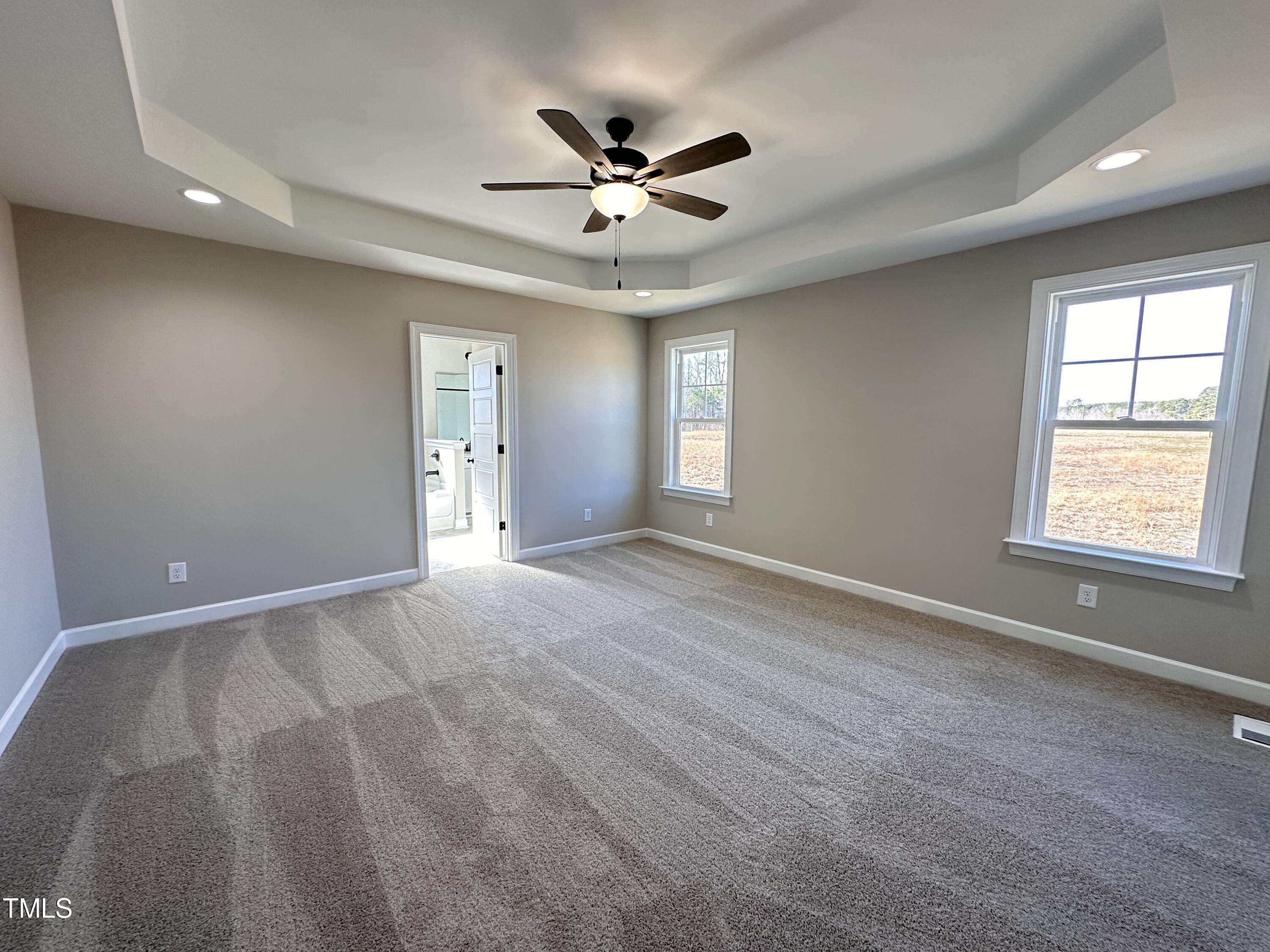 180 Pepperdam Street Smithfield, NC 27577 - Photo 4 of 8 a view of an empty room with a window