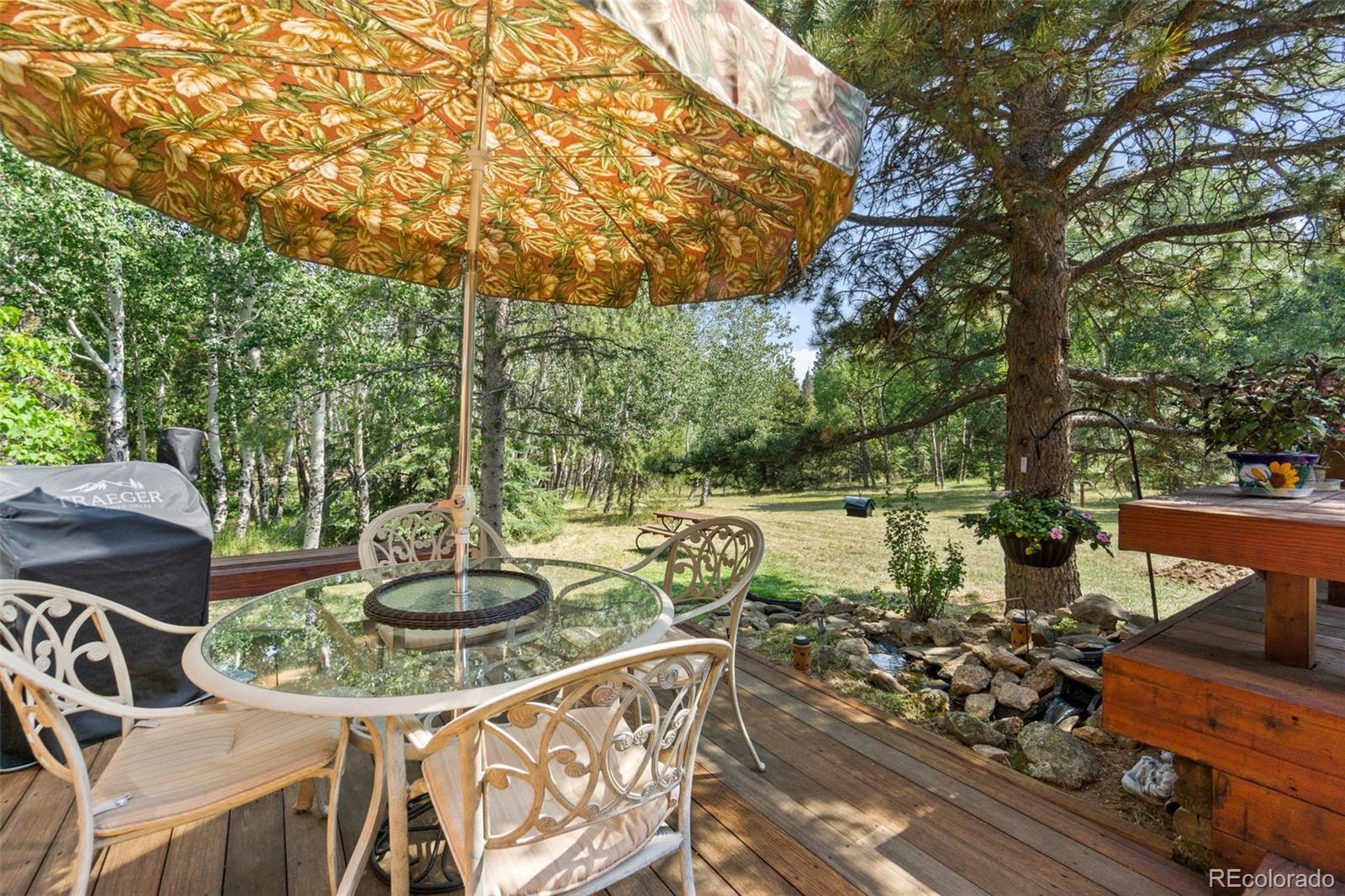 600 Old Squaw Pass Road Evergreen, CO 80439 - Photo 22 of 40 a outdoor view with a sitting space