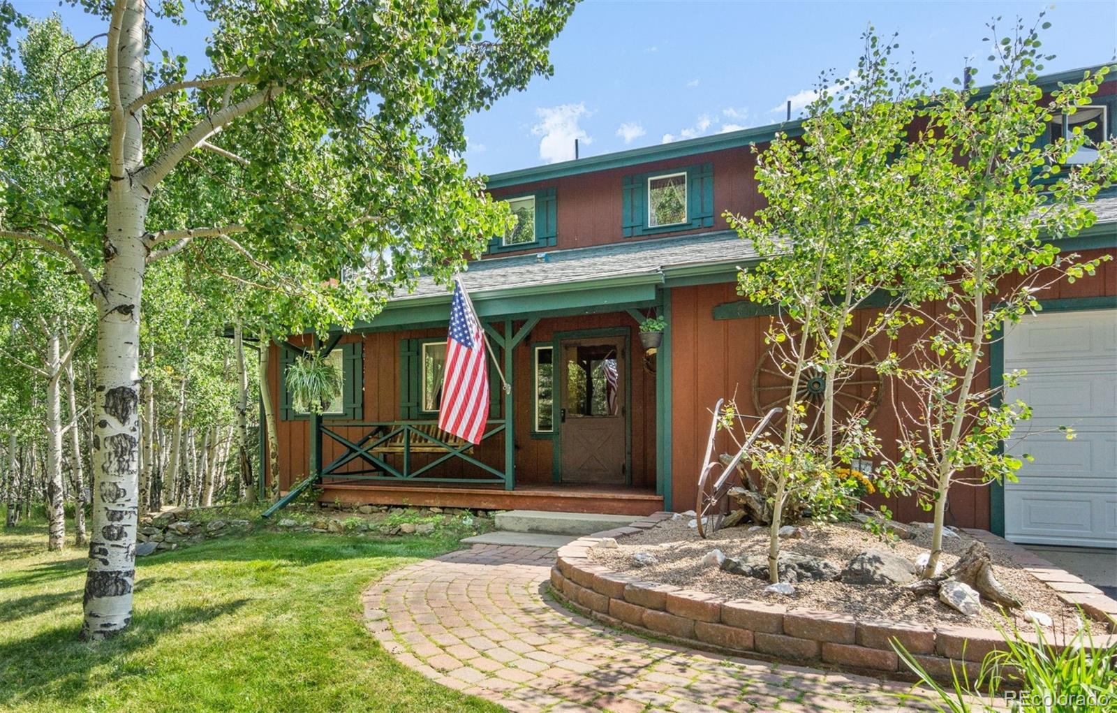 600 Old Squaw Pass Road Evergreen, CO 80439 - Photo 3 of 40 a front view of a house
