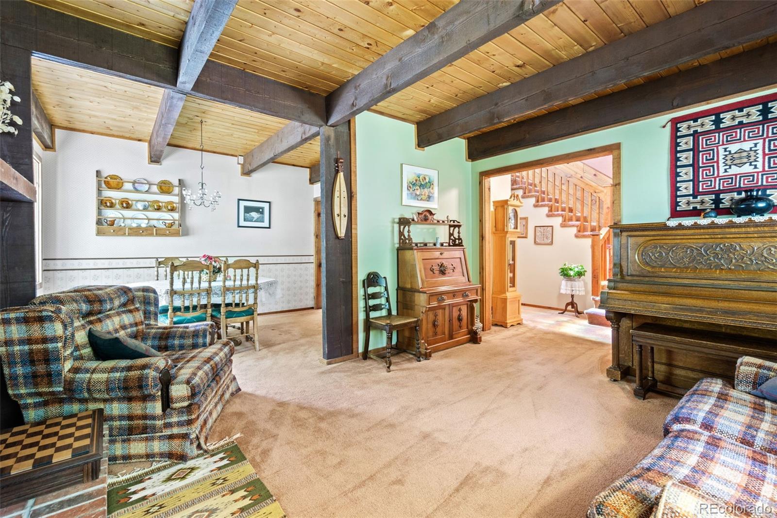 600 Old Squaw Pass Road Evergreen, CO 80439 - Photo 6 of 40 a living room with furniture