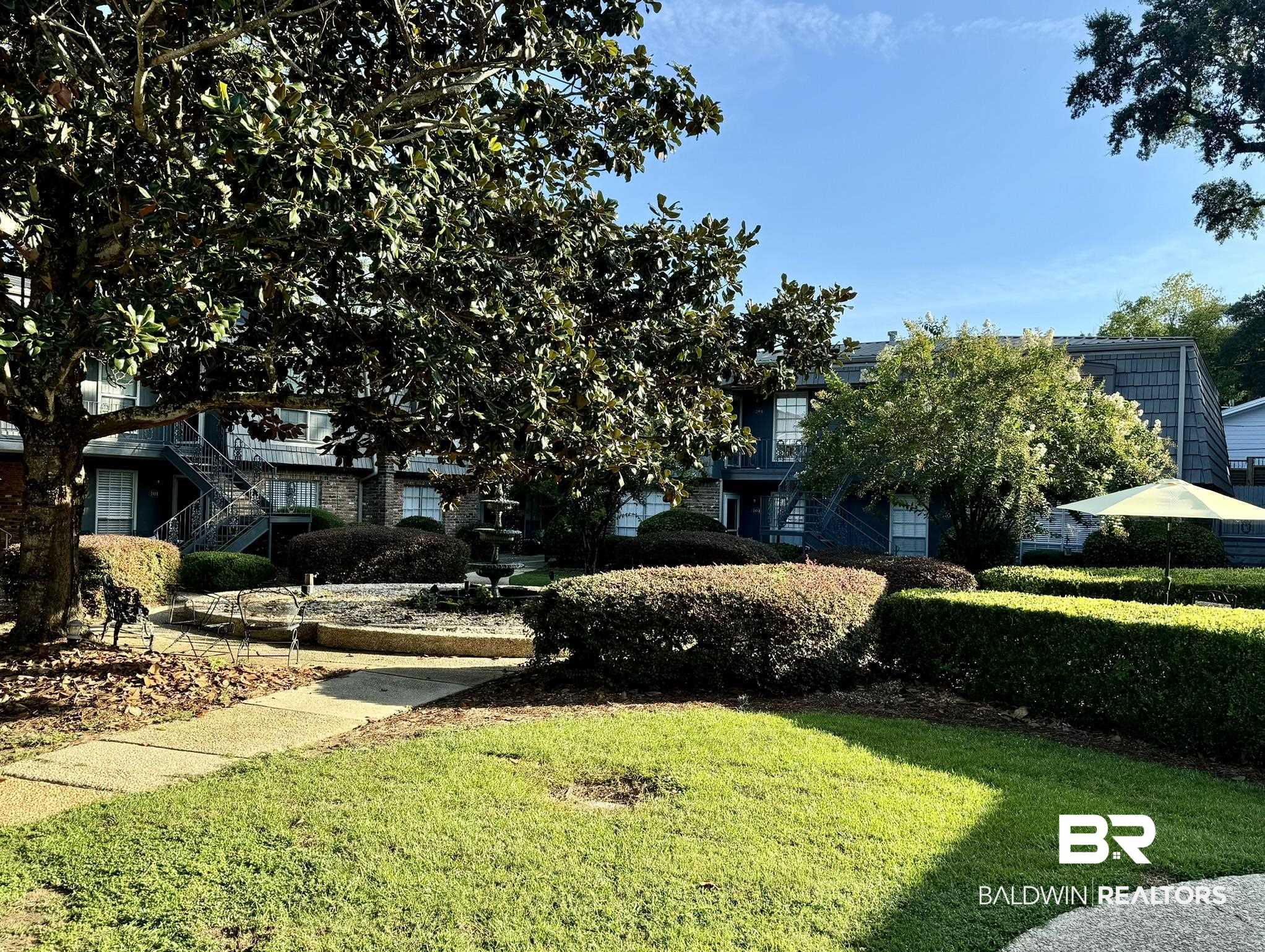 207 South Mobile Street, Unit 217 Fairhope, AL 36532 - Photo 8 of 8 View of yard
