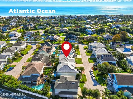 a front view of house with yard and outdoor seating