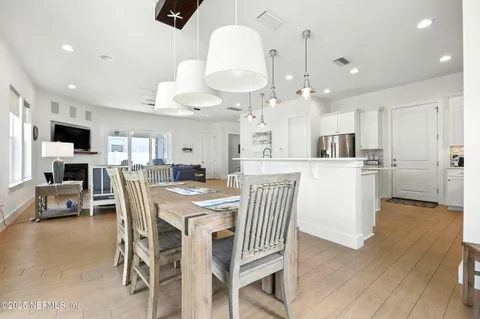 a kitchen with cabinets and steel stainless steel appliances