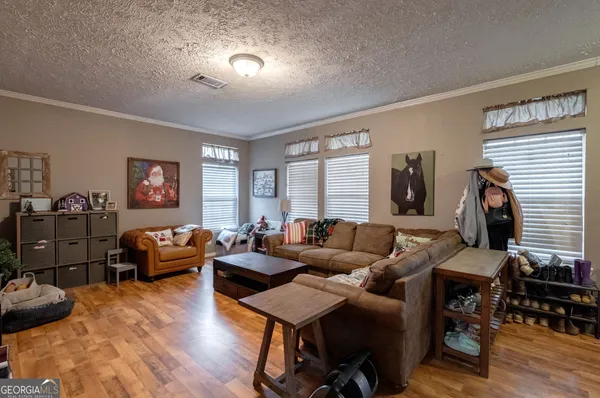 a view of a dining room with furniture