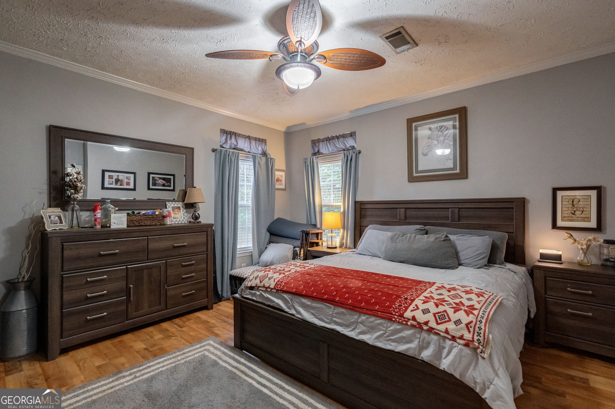 2161 Union Church Road Bishop, GA 30621 - Photo 46 of 47 a bedroom with a bed and a chandelier