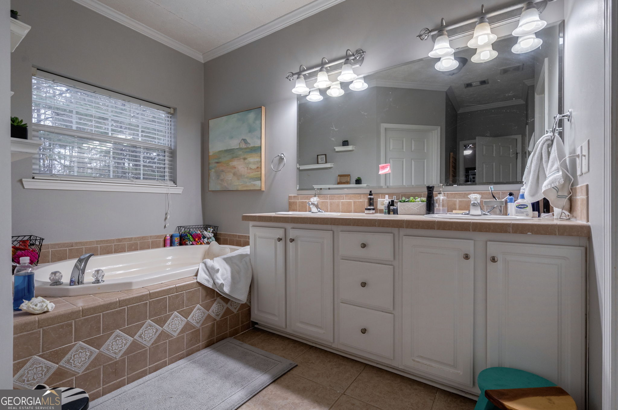 2161 Union Church Road Bishop, GA 30621 - Photo 47 of 47 a bathroom with a double vanity sink mirror and a bathtub