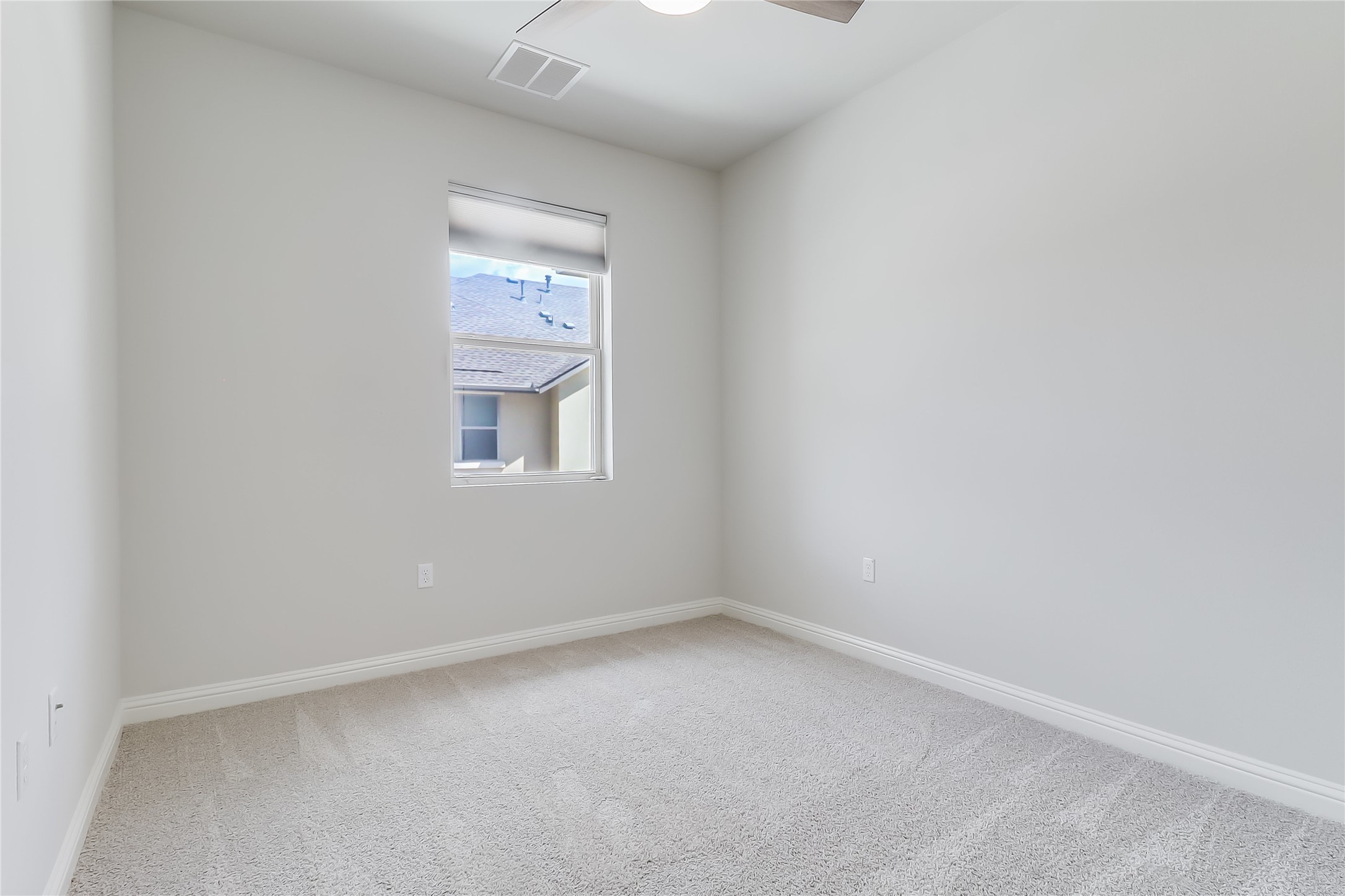 6814 East Riverside Drive, Unit 32 Austin, TX 78741 - Photo 16 of 26 an empty room with a window
