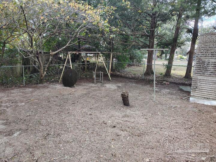 451 East Cane Avenue Crestview, FL 32539 - Photo 18 of 22 a view of backyard with sink