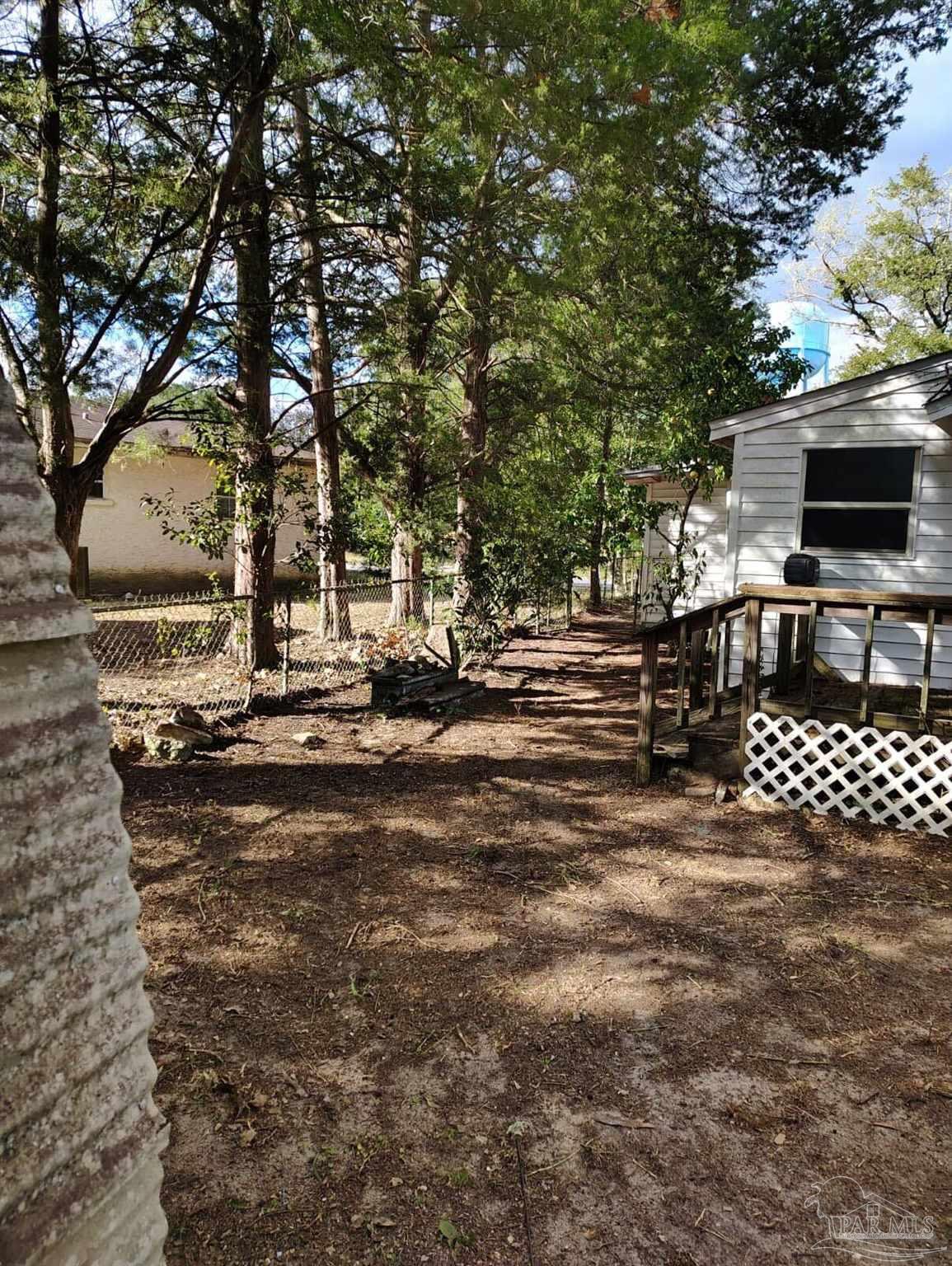 451 East Cane Avenue Crestview, FL 32539 - Photo 22 of 22 a view of outdoor space with garden