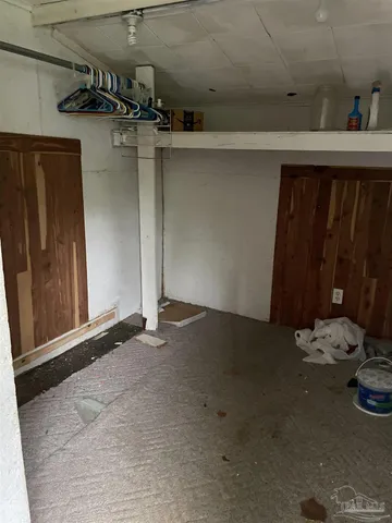 a view of a closet with storage