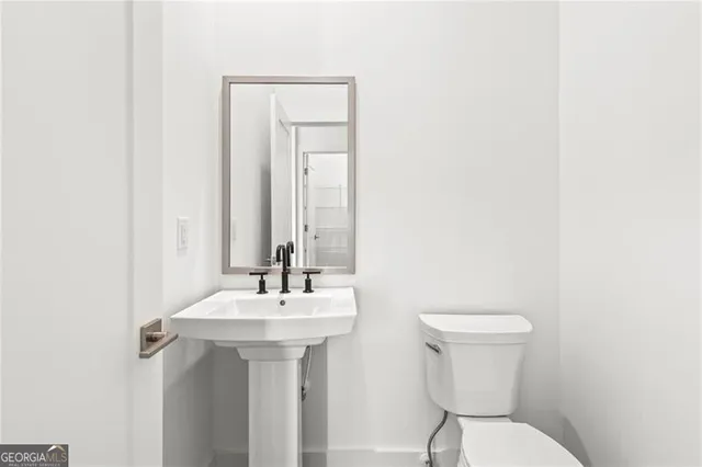 a view of a kitchen with a sink