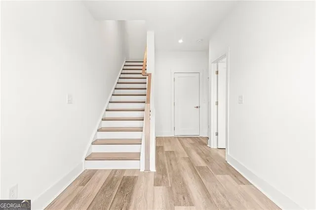 a view of a room with white walls