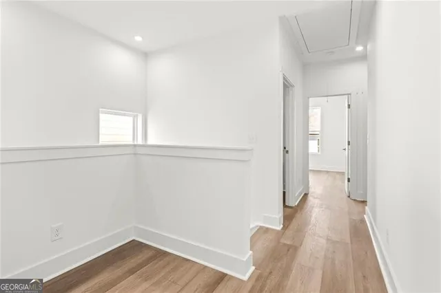 a view of small space with empty racks on the wall