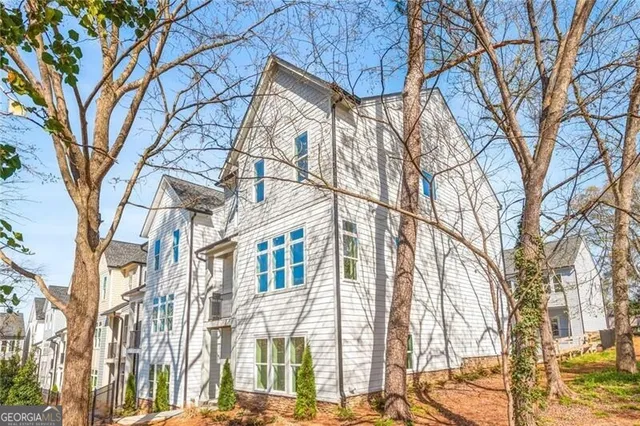 a view of a swimming pool with a lounge chairs
